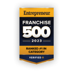 Entrepreneur Franchise 500 badge for 2023, ranked #1 in QSR Franchise category, with a verified icon.