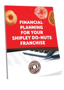 A booklet titled "Financial Planning for Your Shipley Do-Nuts Franchise" adorned with images of donuts, a calculator, and a pen on the cover.