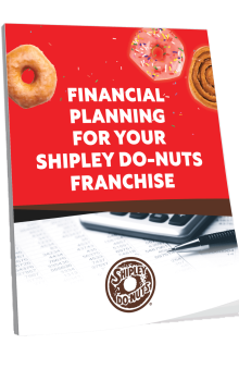 A booklet titled "Financial Planning for Your Shipley Do-Nuts Franchise" adorned with images of donuts, a calculator, and a pen on the cover.